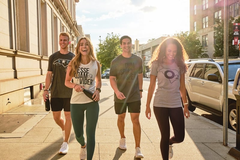 gym members walking in branded gear