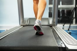 Image of female foot running on treadmill