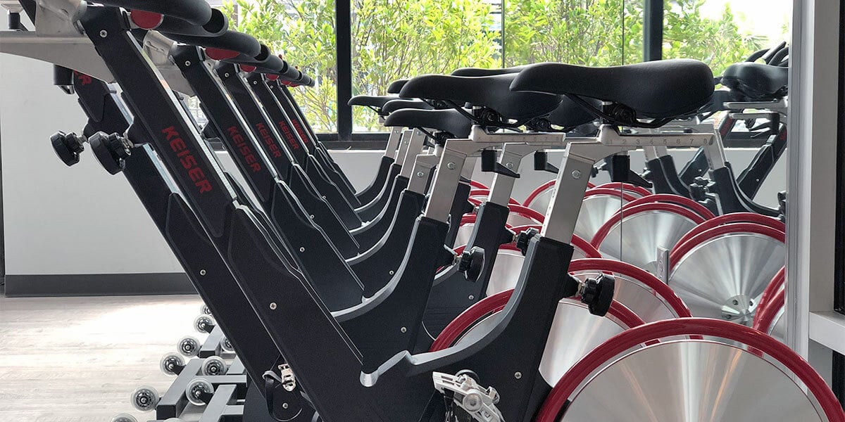 schwinn bikes in a organized row for a cycle class in o2 fitness clubs group fitness studio