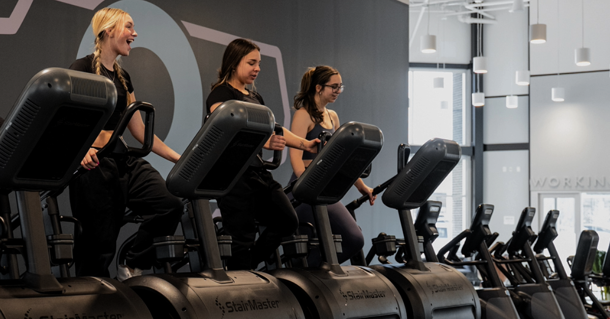 3 Women on the StairMaster inside O2 Fitness Clubs location in Wake Forest, NC