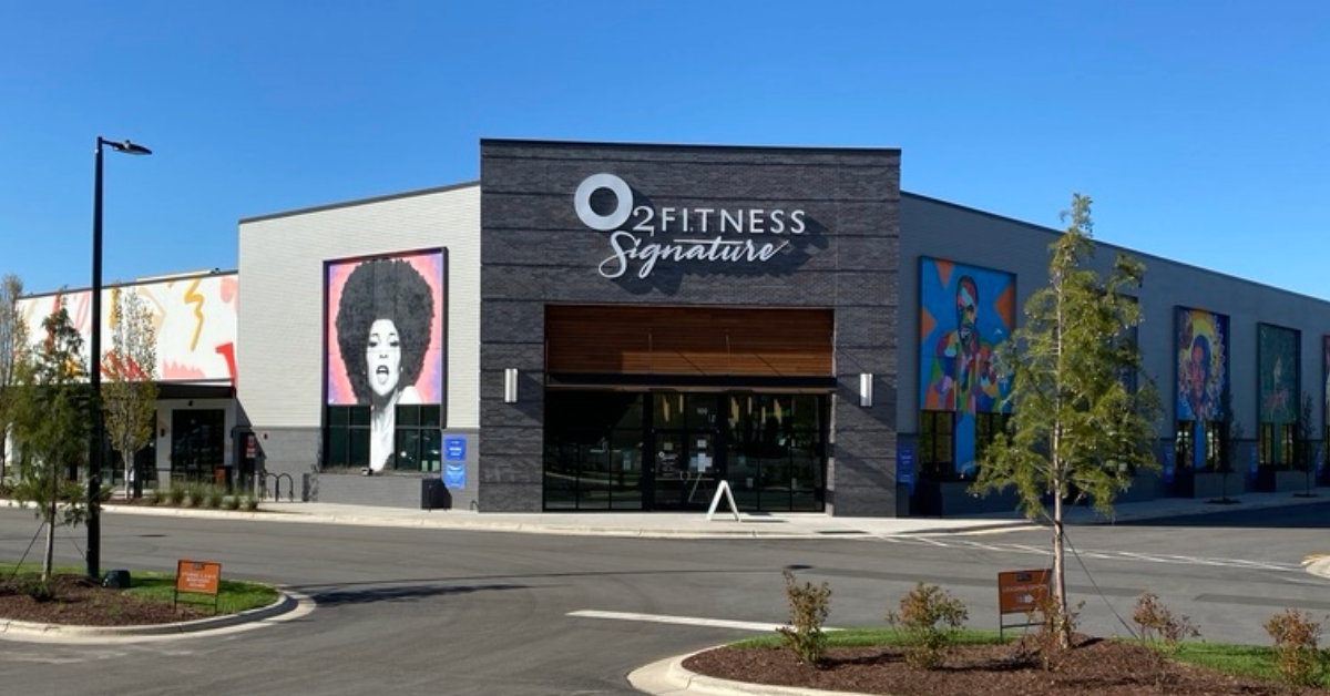 the exterior of o2 fitness clubs durham location in the university hill shopping center